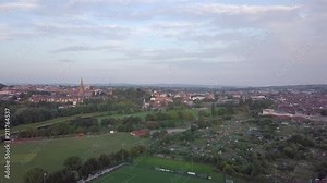 A train passes below an aerial show of Exeter