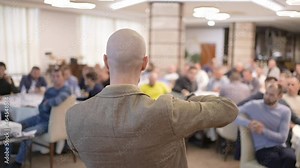 Male Speaker man public on stage speaking talking business conference with presentations. People audience at hall, Seminar, conference, meeting, colleagues, team, training, corporate coaching concept