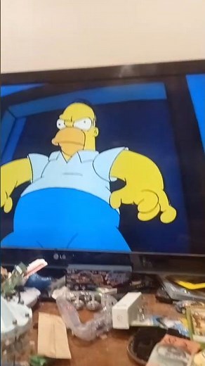 The Simpsons season 6 episode 6 homer looks in the mirror and screams and falls