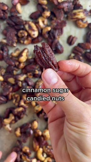 Homemade cinnamon sugar candied nuts! Coated in sugar, cinnamon, and vanilla and then baked until crispy. Absolutely delicious, so easy to make, and perfect as a snack, for a party, or for a holiday gift.⁠ Grab the full recipe on eat the gains! #candiednuts #sugarednuts #holidaysnacks #holidaygifts #easyrecipe