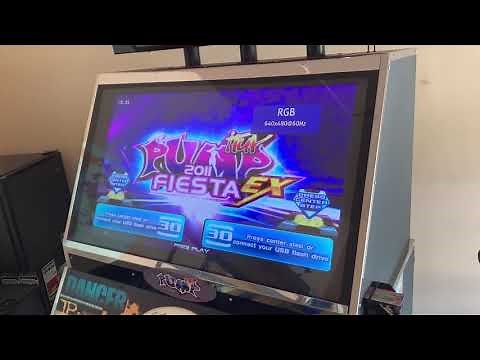 Pump It Up arcade cabinet running multiple versions at the same time