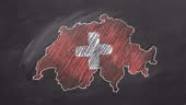 Country map and flag of Switzerland drawing with chalk on a...