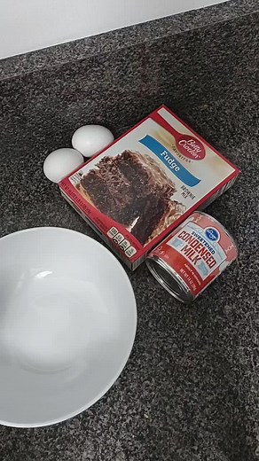 Box Brownie Hack. you will need one box brownie mix, 2 eggs, and 1 can (14 oz) of sweetened condensed milk. mix all ingredients together, pour into 9x9 baking pan. bake at 350° F for 30 minutes. #brownie #boxbrowniehack #dessertrecipe #dessertsoftiktok #easyrecipe #dessertreview #chocolatebrownie #desserthack #viralbrowniebox