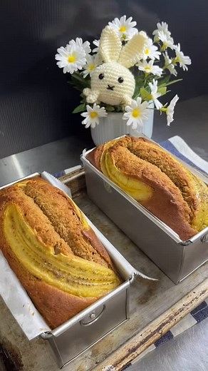 Baked these two tall loaves for family…using Gula Melaka instead of brown sugar. Recipe below for those who wish to try baking this delicious cake: For 2 pans 7x3” (A) 230 gm Unsalted Butter 187gm brown sugar (can use palm sugar) 1tsp vanilla extract 5 large eggs In a mixing bowl, beat butter, sugar & vanilla until light. Add egg, one at time, beat until incorporated. (B) 306 gm bananas, mashed Add banana to (A) above & beat until incorporated. (C) 312 gm cake flour 2 tsp baking powder 1 tsp bak