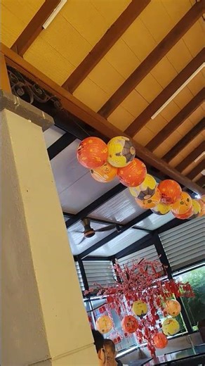 8 Deka Concept Mini ceiling fans at a restaurant outdoor porch, public sighting.