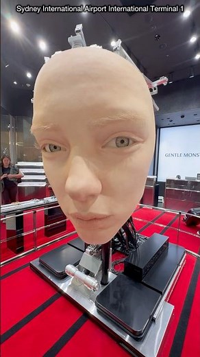 COOL ROBOTICS OR CREEPY? THE GENTLE MONSTER “GIANT HEAD” AT SYDNEY INTERNATIONAL AIRPORT TERMINAL 1.