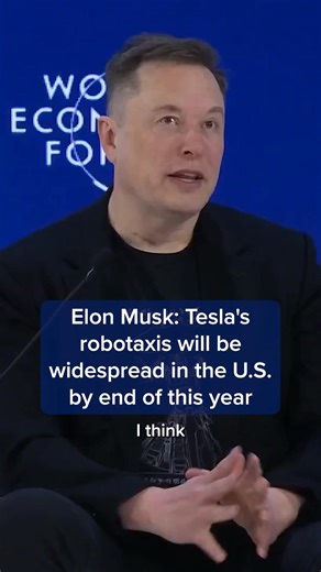 Tesla CEO Elon Musk said on Thursday that his company will have a “widespread” network of driverless robotaxis in the U.S. by the end of 2026. “Tesla’s rolled out robotaxi service in a few cities, and will be very, very widespread by the end of this year within the U.S.,” he said during an appearance at the World Economic Forum in Davos, Switzerland. Read more: cnb.cx/4bHDmba | CNBC