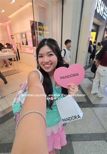 got the Japan exclusive Pandora charm for my travel bracelet 🩷 it's waaaaay cheaper too! ✨ #japanpandora #travelcharm #sakura #pandorabracelet #souvenir