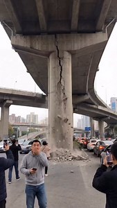 31K views · 9.8K reactions | Bridge Support Fails During an Earthquake… People Below Just Keep Filming During an earthquake, a bridge support starts cracking and collapsing—dust and chunks falling—while people below stand there recording on their phones like they’re fearless. Bro… move back! #earthquake #bridge #wtf #viral #reels | The.worldai | Facebook