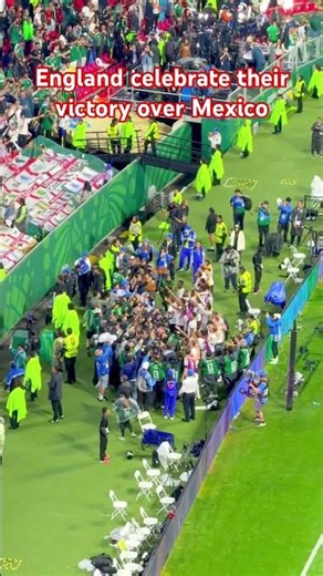 England player and fans celebrate victory over Mexico