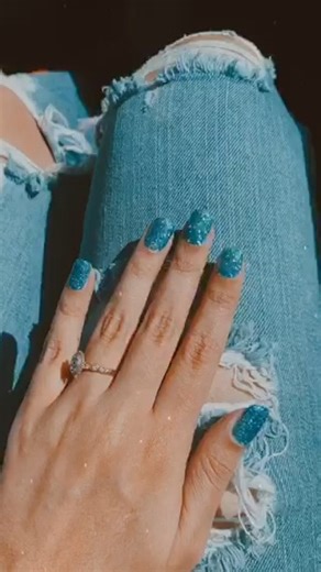 Pairing our jeans with these shimmering blue glitter nails for a true mermaid vibe! 🧜‍♀️✨ Shade: Mermaid | ROSSI Nails