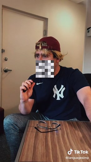 Polyglot Linguist Doing the Guess the Language Challenge