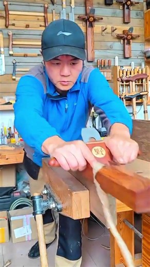 smoothing wood with a hand plane to create a flat surface for a carpentry project