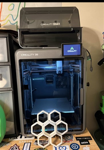 The Creality K2 Combo is an advanced, pre-assembled 3D printer featuring the 4-slot Creality Filament System (CFS) for up to 16-color, multi-material, and high-speed printing. It includes AI camera monitoring, smart auto-leveling, and a sturdy enclosed frame, designed for quiet operation in home or office settings.