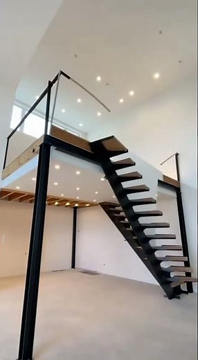 Modern Minimalist Loft Renovation Featuring Stunning Floating Stairs