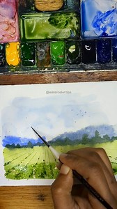 Watch how this scenic view comes together using some of my favorite beginner-friendly tricks! From soft mountain peaks to lush trees, I’m showing you how to build a landscape layer by layer. The highlight? Watch closely as I use the reverse side of my brush to create those perspective lines in the farmland. It’s a game-changer for adding instant depth and texture! 🌾🖌️ Which part of a landscape do you find the hardest to paint: the sky, the mountains, or the ground? Let’s help each other out in