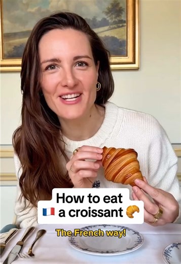 Croissant etiquette 🥐🇫🇷 Two ways to eat a croissant: tear off small pieces (the more elegant way) or bite straight into it (the real way). Remember the important rule: no knives or silverware ever (unless your spreading something on your croissant). Team tear or team bite? 👇 For my favorite croissants in Paris, the full list is in my Paris Guide. Find it via the link in my bio or at hellofrenchnyc.com And tell me, what is your go to boulangerie in Paris? 📍@Ritz Paris . . #French #Croissant 