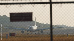 Passengers airplane landing to airport runway, mileage and braking speed reduction