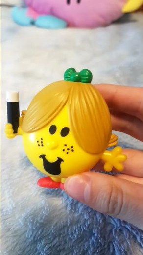 Little Miss Magic Turns Mr. Snow Into A Book