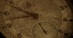 Download Extreme close up shot of clock hands moving from 10:30 to 8:30 in 4K time lapse for free