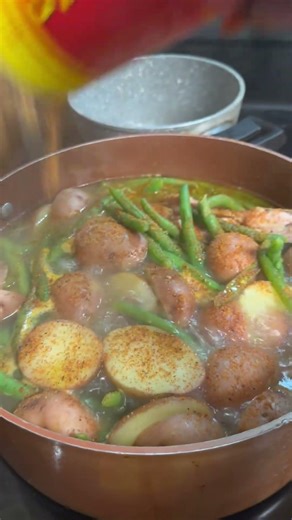 String beans and red potatoes cooked in smoked Turkey and Cajun Seasoning