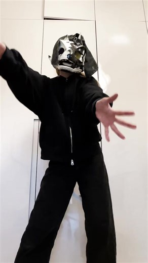 Furry Dance Moves in a Dino Mask