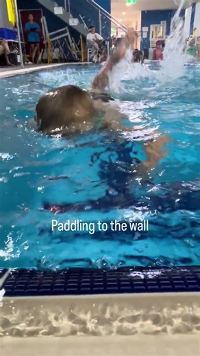 This is what learning to swim looks like at 3 years old. Safety first, perfection second.