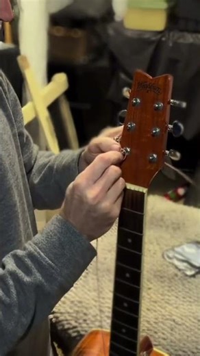 How To Restring An Acoustic Guitar Like A Caveman (this tip helped)