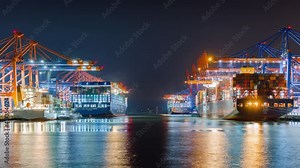 Container ship loading and unloading in deep sea port, Low angle View of business logistic import and export freight transportation by container ship, Container loading cargo freight ship, Time Lapse