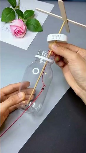 DIY Spinning Mechanism with Bottle and Rubber Band