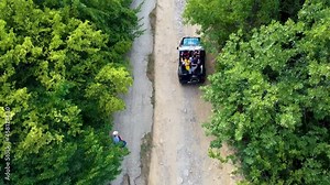 Dzhur-Dzhur waterfall in Crimea offroad jeep waterfall waterfall amazing crimea, tourism aerial stream aragliding flight, flyover. Flowing natural ngle , djur wild park.