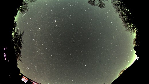 All-sky camera on 251221. 545 minutes of 60-second exposures using ZWO ASI385 camera and 3.5mm lens. Processed in Siril and assembled with PIPP. Polaris, the North Star, is the stationary star in the lower middle of the frame. Jupiter appears as the brightest star. There aircraft and satellite trails along with several meteors. | Vince Laine