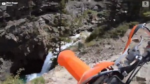 Dirt biker goes off cliff, avoids serious injury