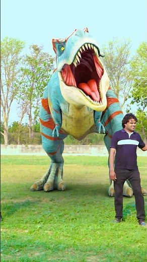 T-Rex Dinosaur, Raptor Dinosaur & Giganotosaurus Dinosaur seen together with their Dinosaur Trainers