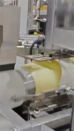 The process of making product packaging in large quantities using advanced machines in a factory