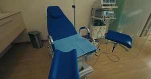 Interior of Gynecology Room in Medical Clinic Gynecological Bed in Obstetrics and Gynecology