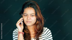 Girl getting angry, mad, disappointed from phone call, text. Emotions and face expressions concept