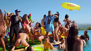 Yo Gotti Brings in DaBaby for a Wild Pool Party in New 'Drop' Video