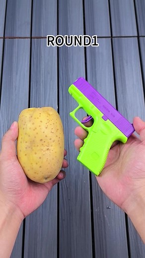 Toy gun VS potato.