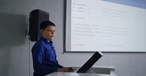 clip-3549854485-school-student-boy-speaking-front-classmates-classroom