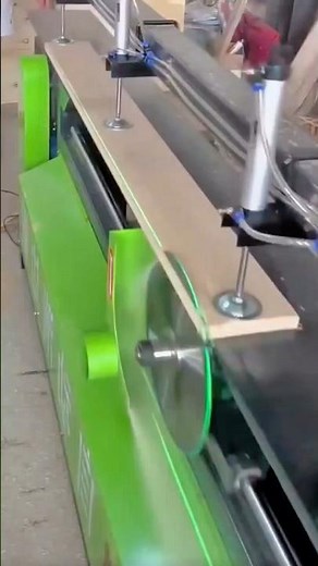 Automatic edge banding machine sealing wood panel edges with precision