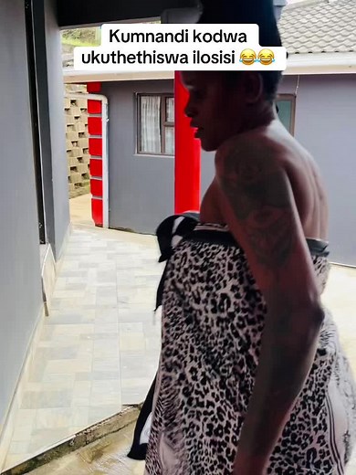 Engaging Cleaning Routine in a Leopard Print Dress