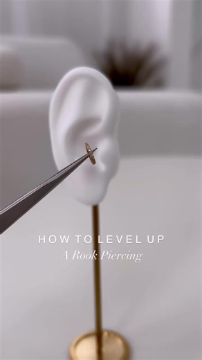 How to level up your rook piercing by adding a dainty charm to your cartilage hoop creating a look that’s completely unique to you 👂🏼✨ #rookpiercing
