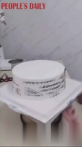 12K views · 776 reactions | Here is a special birthday cake for those who love to study! A cream cake full of math formulas designed by a Chinese baker has gone viral on Chinese social media. | People's Daily, China | Facebook