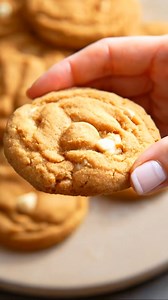 Butterscotch Pudding Cookies Ingredients: - 1 cup unsalted butter, softened - 3/4 cup brown sugar - 1/4 cup granulated sugar - 1 package (3.4 oz) butterscotch pudding mix - 2 large eggs - 1 teaspoon vanilla extract - 2 cups all-purpose flour - 1 teaspoon baking soda - 1/2 teaspoon salt - 1 cup butterscotch chips Directions: 1. Preheat your oven to 350°F (175°C). 2. In a mixing bowl, cream together the softened butter, brown sugar, and granulated sugar until smooth. 3. Add the butterscotch puddin