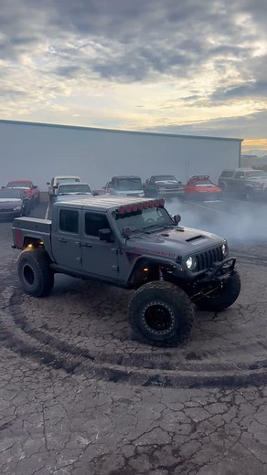 Vlog Dawgz on Instagram: "New vehicle added to the arsenal‼️ @amw4x4 built @heavydsparks a brand new custom AMW 1025 Demon 170 - @motobilt_inc Full Bed Replacement Kit! - @kmcwheels x AMW collaborated forged wheels, wrapped in @nittotire 42” Trail Grappler Tires. - @kchilites Gravity Titan Bar and even an AMW extended-range fuel tank!"