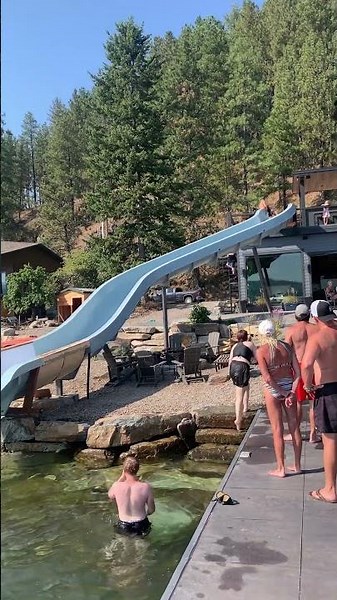 Madison doing new water slide at house