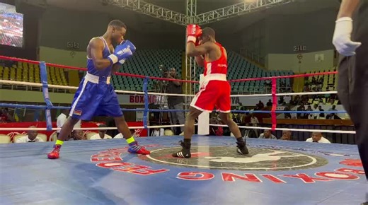 Africa zone 3 boxing championship featherweight final between Kassim Murungi of team Uganda & Mwinyi Kombo of team Kenya in blue