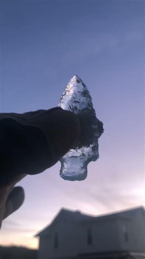 Arrowhead made from flintknapping a chunk of glass.