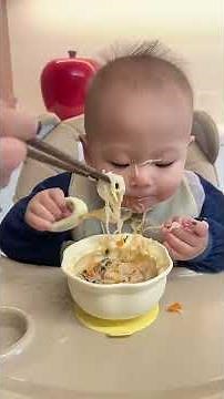 12-month-old baby immerses in eating, cute baby snack food, independent eating training #2